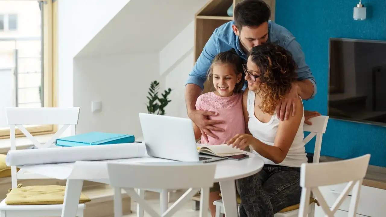 Loving couple with child at home