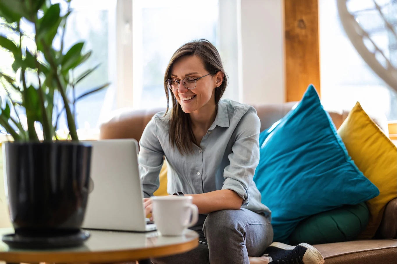 Woman explores HELOC options on a laptop.