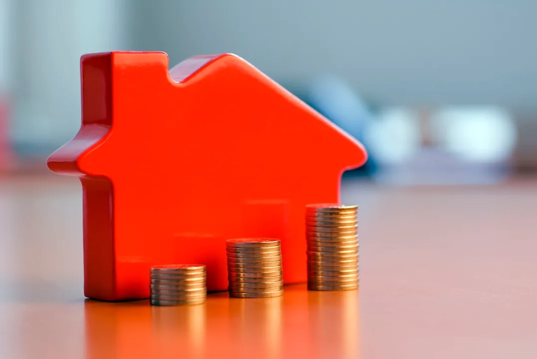 House with stacks of coins