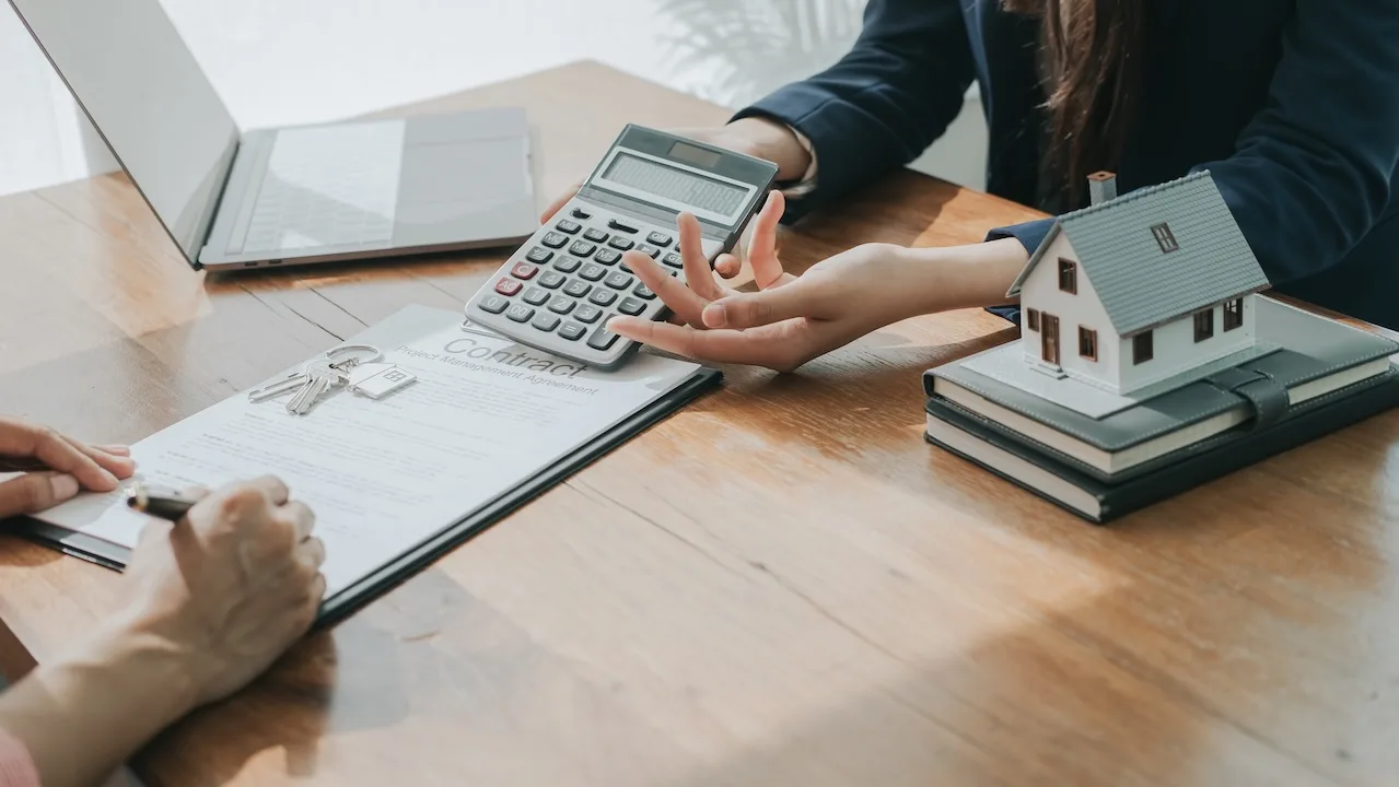 Borrower signs paperwork