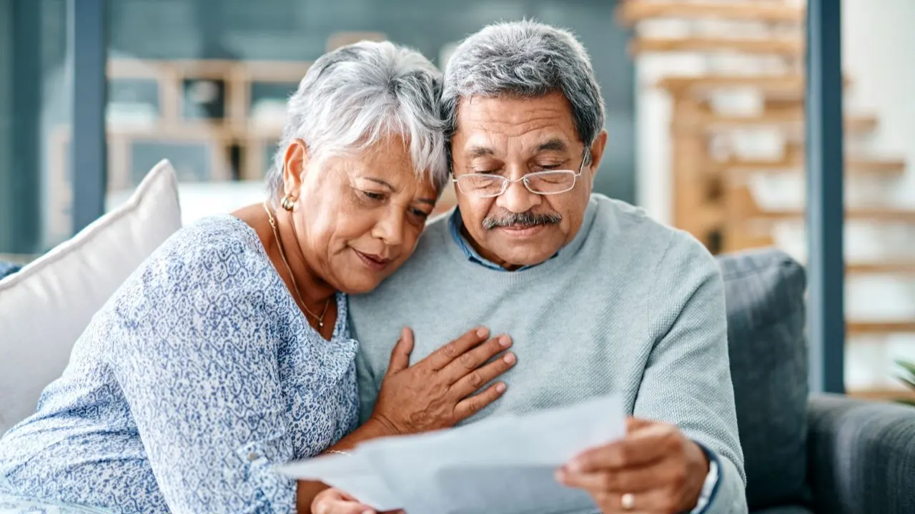 Couple reviewing unexpected medical bill